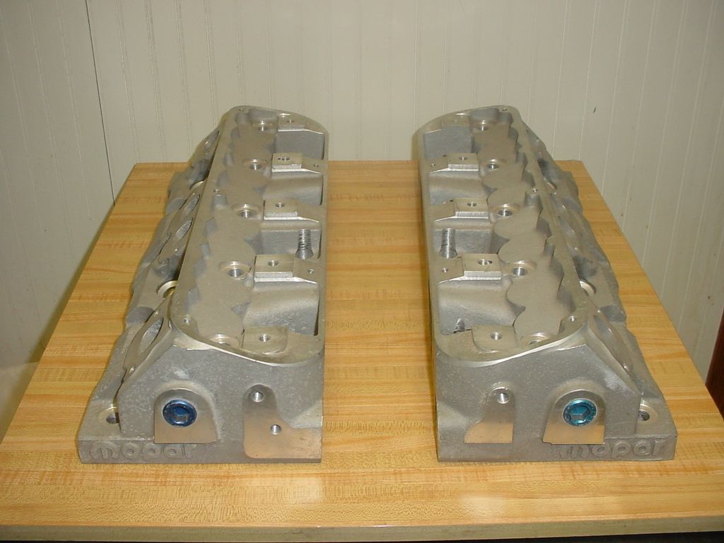 New mopar 4452926 w5 w5 small block heads blue core plugs 340 360 raw